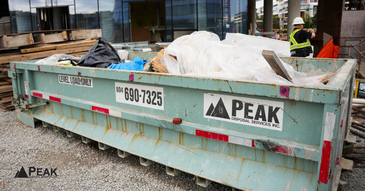 Peak Disposal Services bin at Surrey job site.